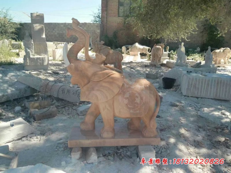 鼻卷如意的大象石雕，晚霞红吉祥如意大象[1]