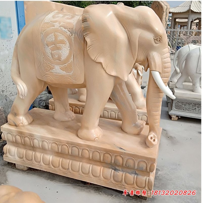 鼻卷如意元宝的大象石雕晚霞红门口镇宅石雕大象 