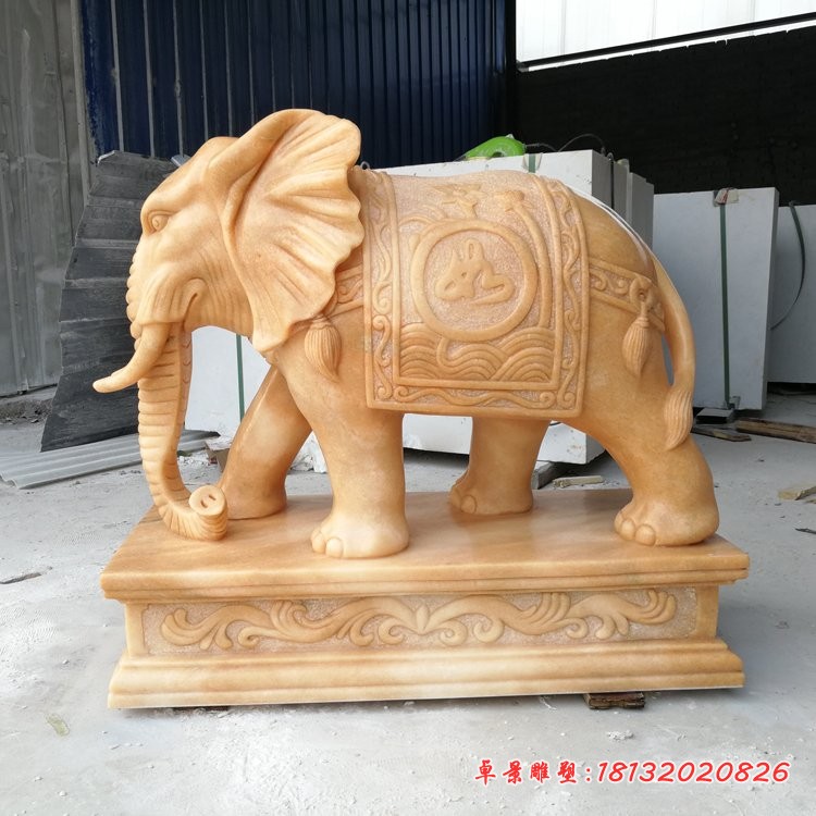 鼻卷如意元宝的大象石雕晚霞红门口镇宅石雕大象