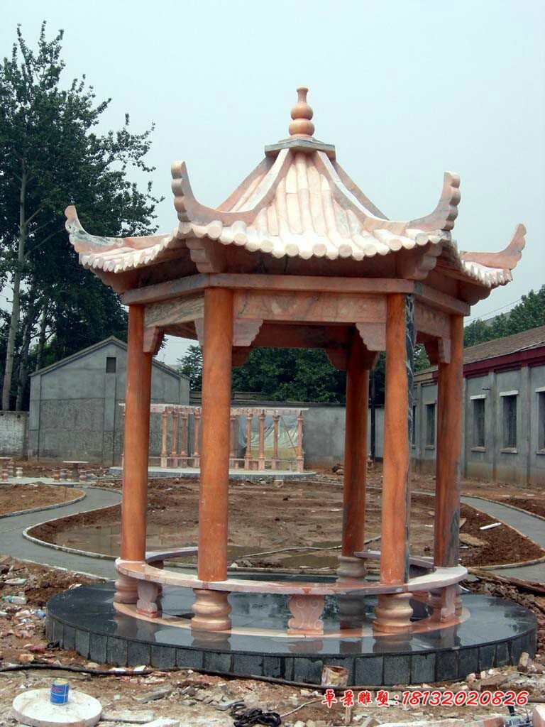 公园六角凉亭石雕，晚霞红凉亭石雕