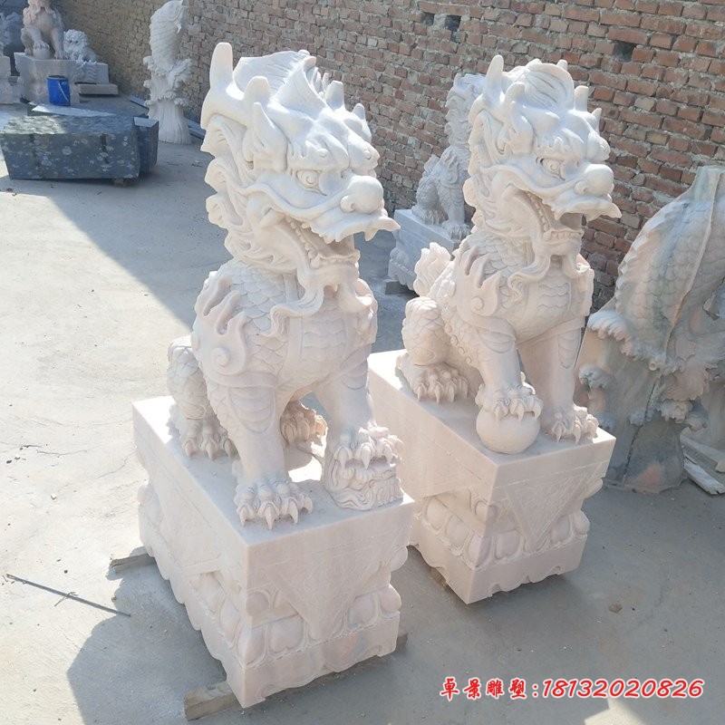 晚霞红踩球石雕麒麟镇宅神兽石雕