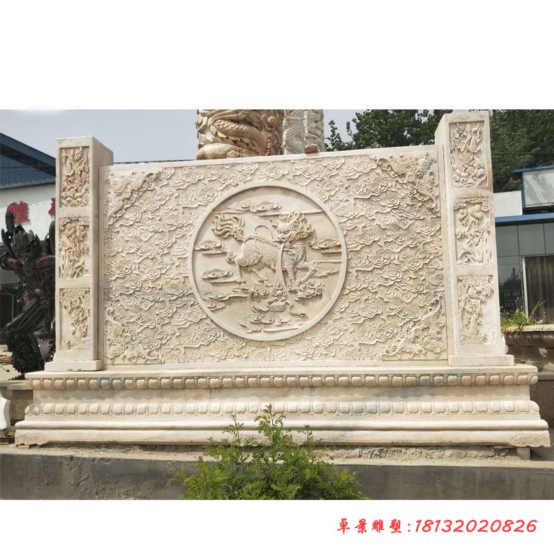 祥云麒麟浮雕影壁，晚霞红影壁石雕