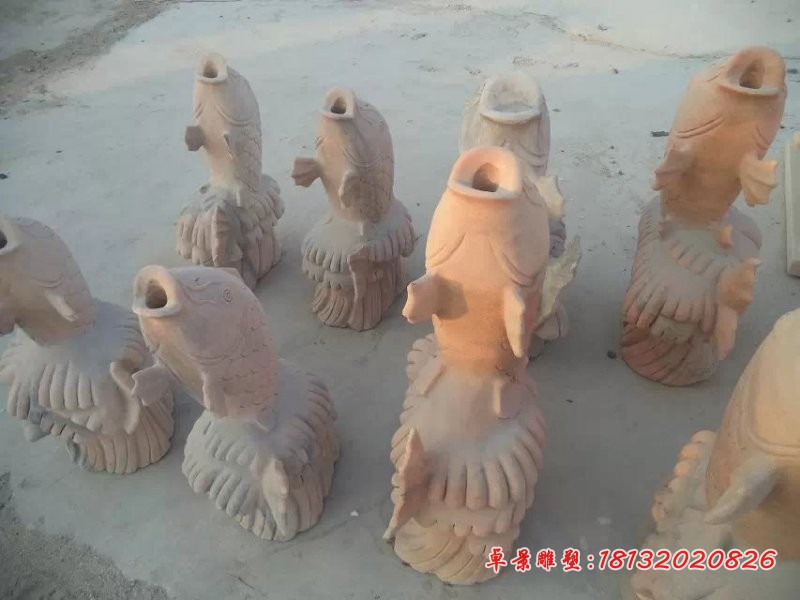 喷水鱼雕塑，晚霞红石雕鱼