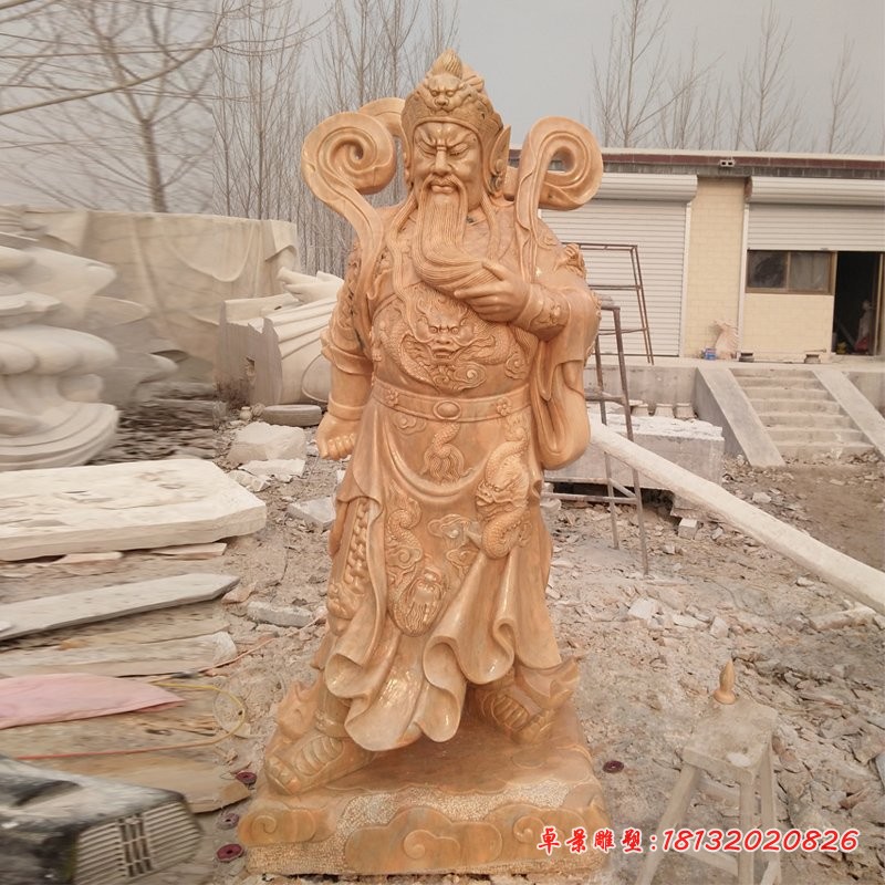 晚霞红石雕关公，武财神石雕