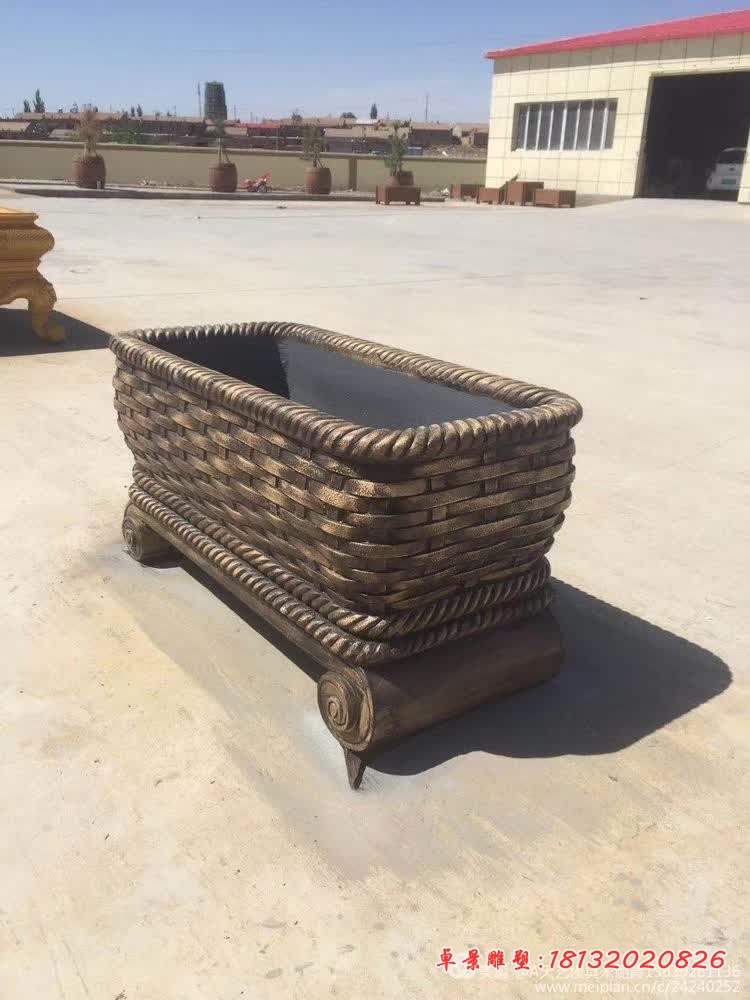 编织花纹浮雕石水缸