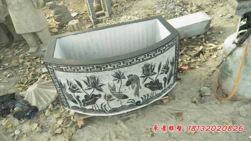 荷花浮雕石水缸