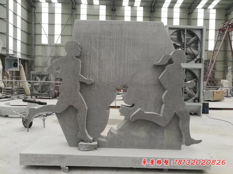 剪影跑步人物石雕