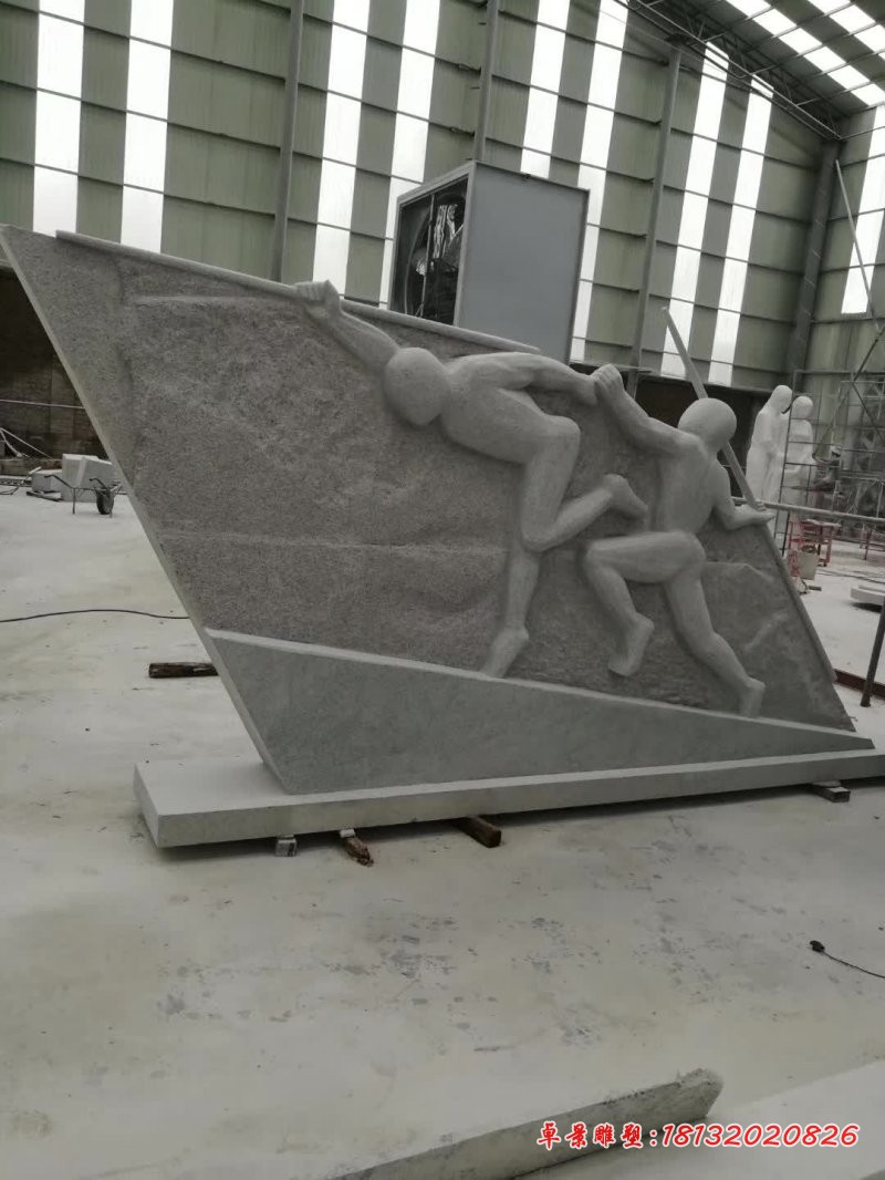 剪影扔标枪人物石雕