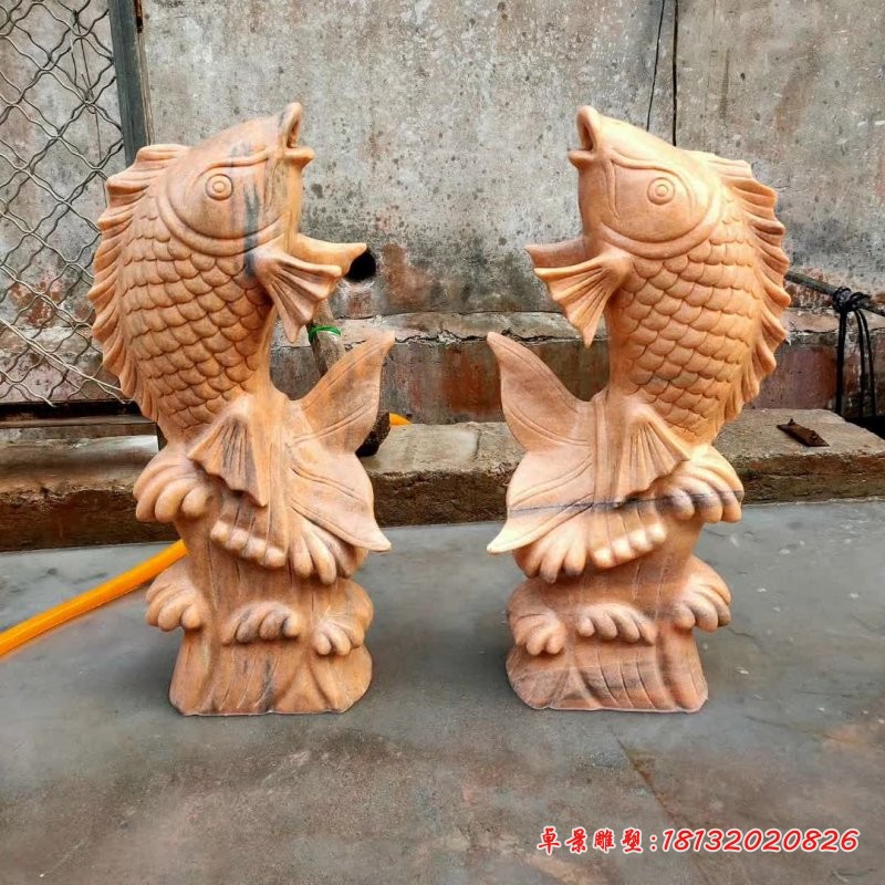 晚霞红喷水鲤鱼石雕 