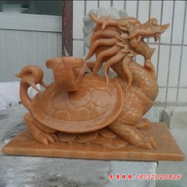 晚霞红驮如意的龙龟石雕