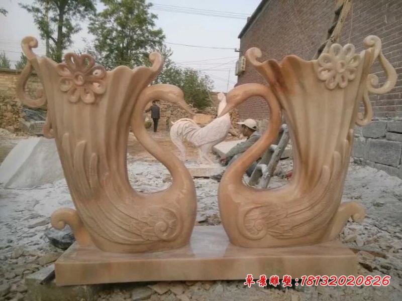 抽象天鹅雕塑晚霞红动物石雕