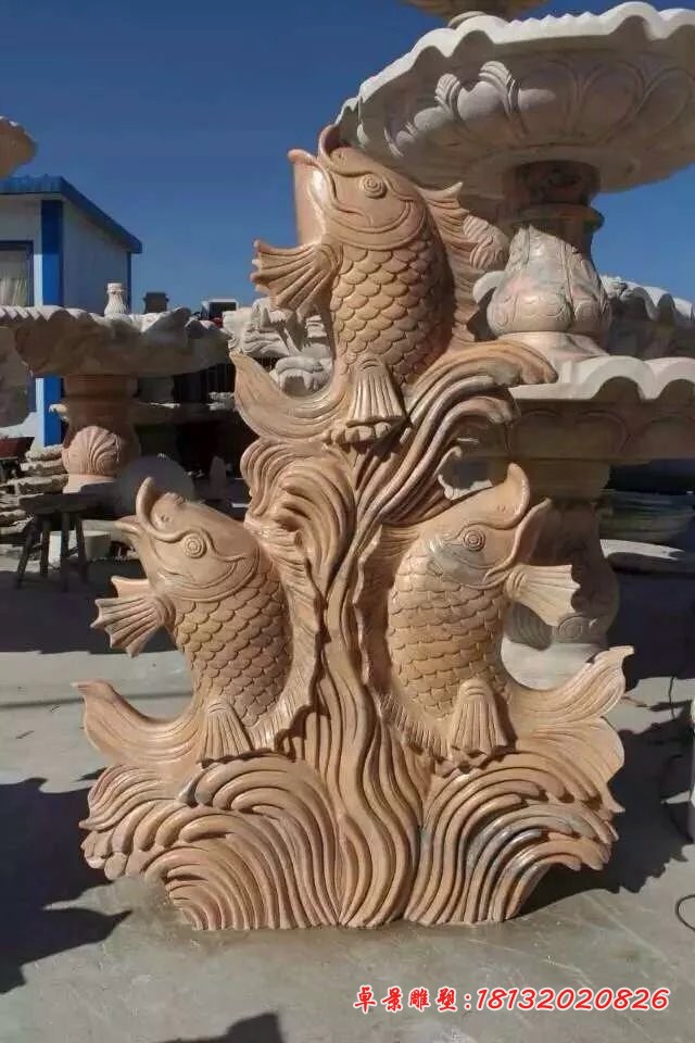 喷水鱼雕塑晚霞红石雕鱼