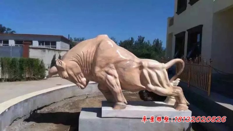 石雕开荒牛晚霞红石雕牛