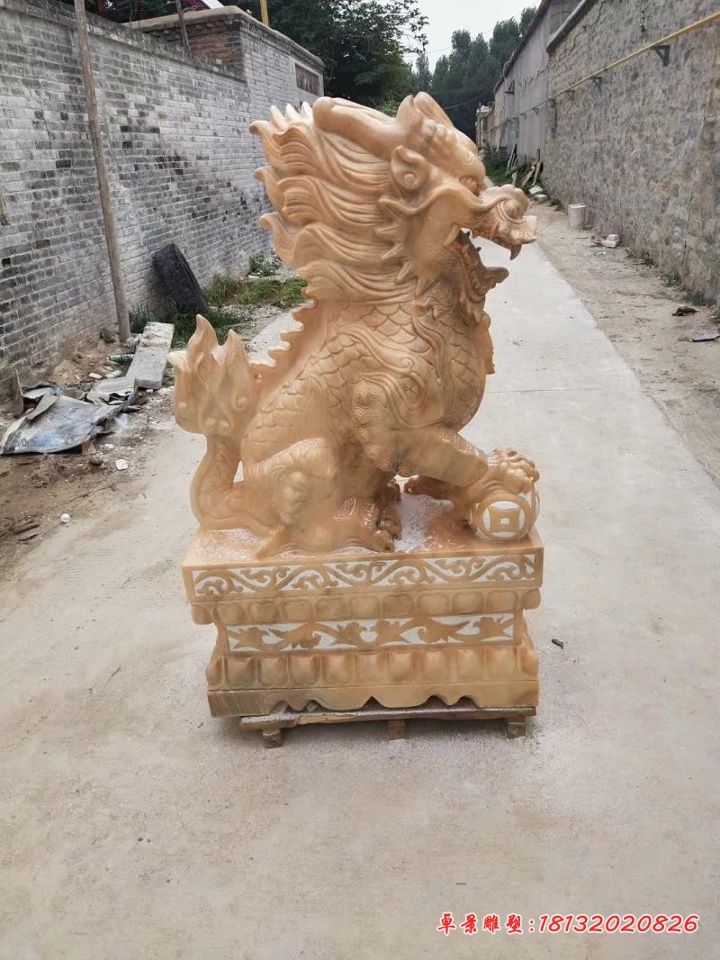 晚霞红踩球麒麟石雕 