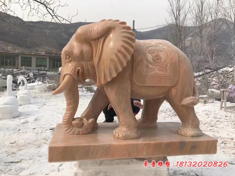 晚霞红卷财大象石雕