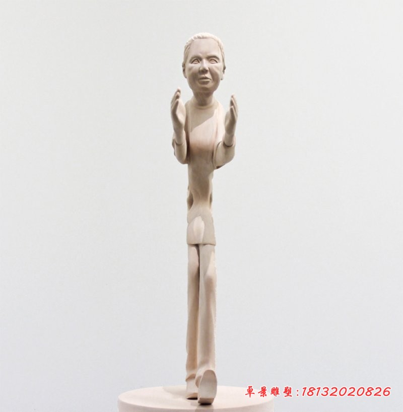 被大风吹的抽象人物石雕，公园人物雕塑 