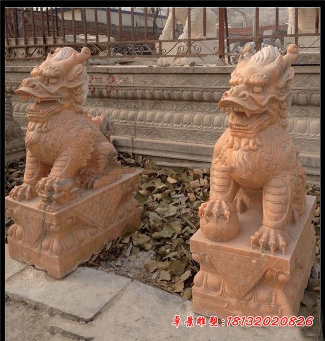 石雕踩球麒麟晚霞红麒麟雕塑