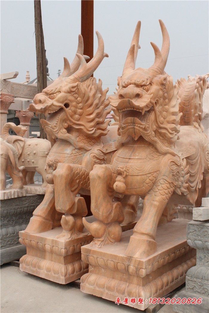 石雕踩球麒麟晚霞红麒麟雕塑 