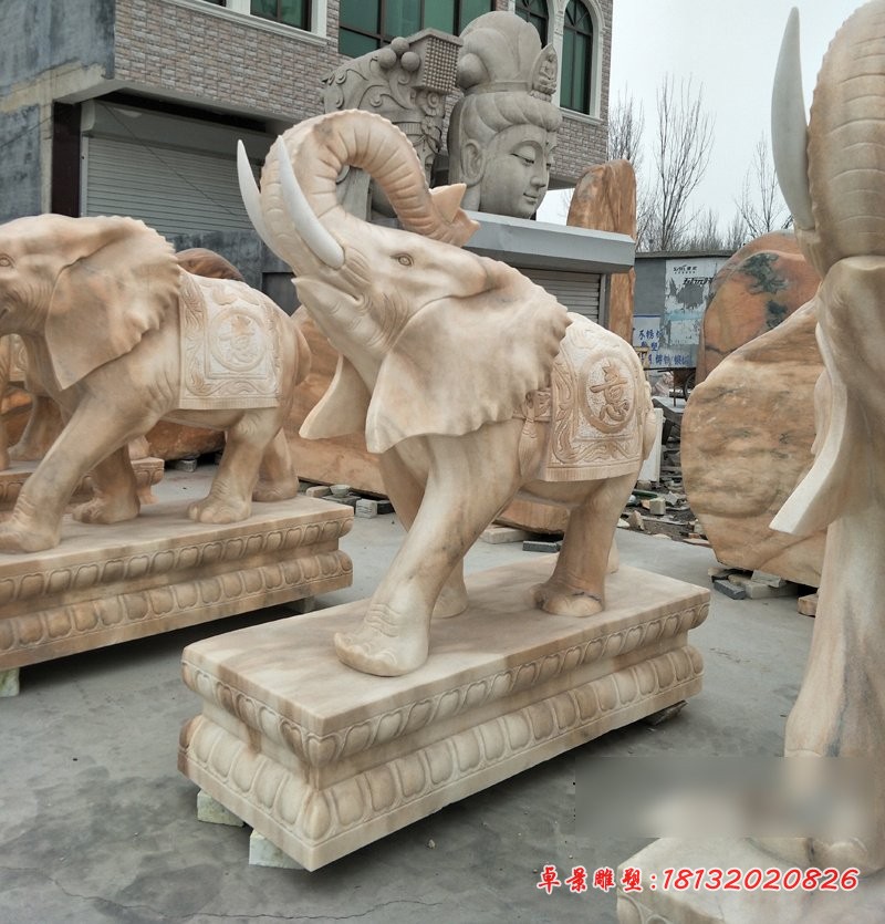 如意象石雕，晚霞红象鼻向上大象石雕