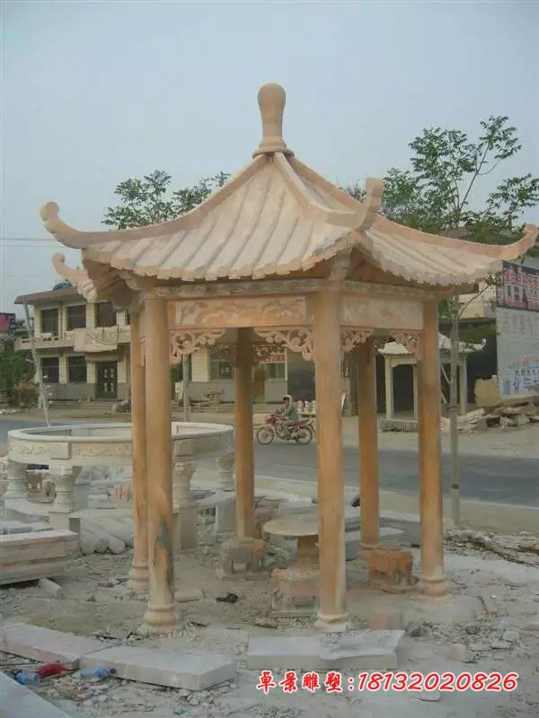 公园凉亭石雕晚霞红石亭子