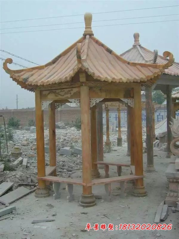 公园凉亭石雕晚霞红石亭子 