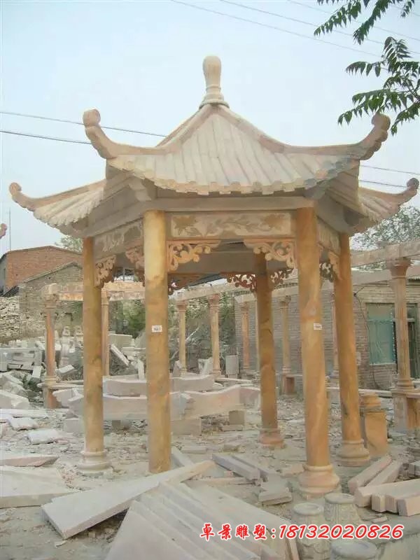 公园凉亭石雕晚霞红石亭子