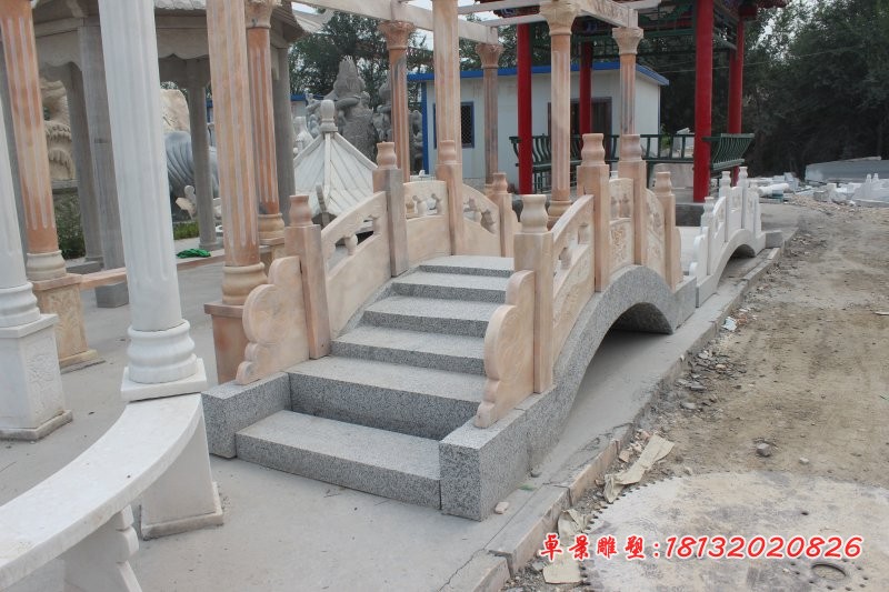 公园石雕拱桥晚霞红石桥雕塑 