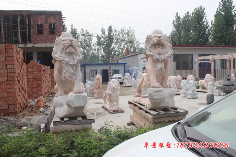 企业狮子石雕晚霞红西洋狮子 