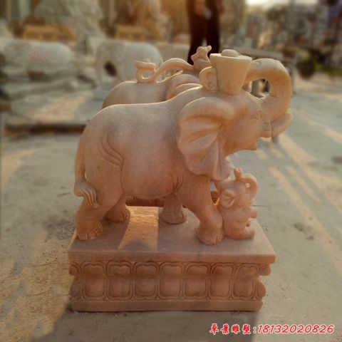 石雕企业门口晚霞红大象