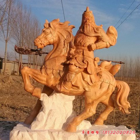 晚霞红骑马关公石雕