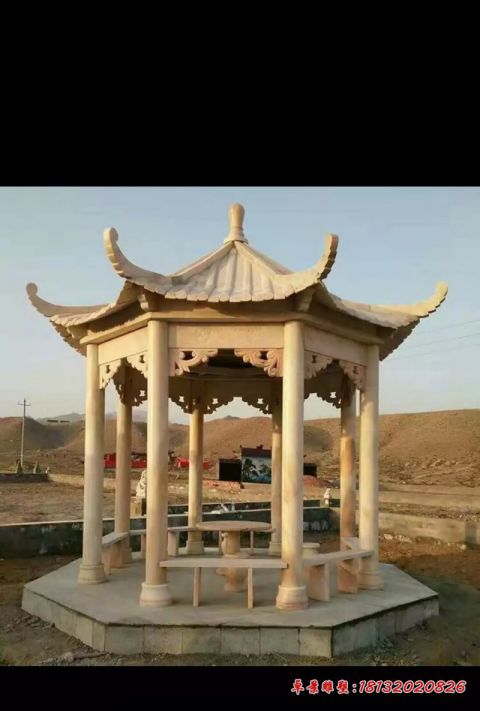 公园晚霞红八角石雕凉亭