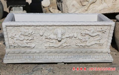 龙浮雕方形石水缸