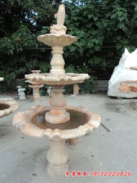 小区石雕三层晚霞红喷泉