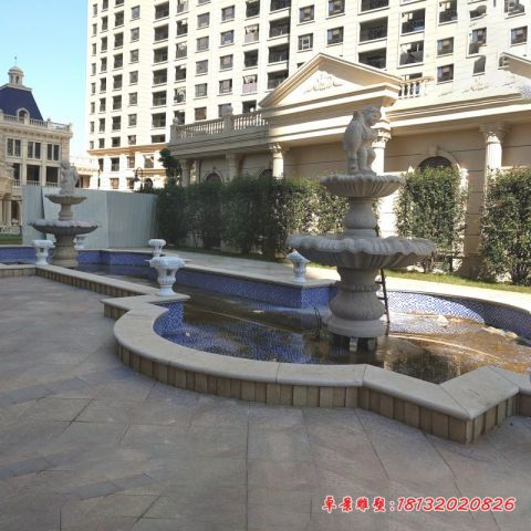 小区西方男孩喷泉石雕