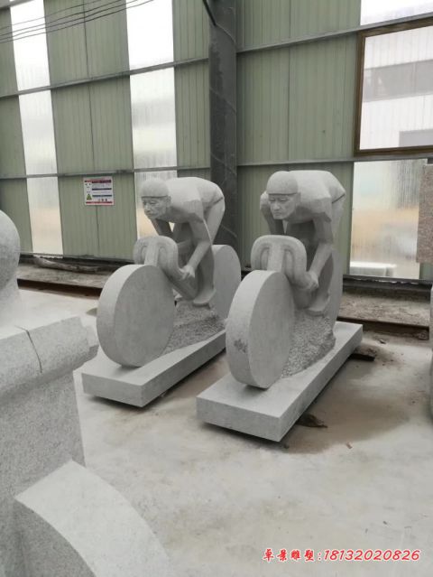 公园人物骑自行车石雕