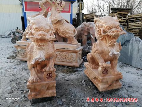 晚霞红日进斗金石雕麒麟