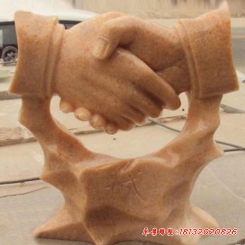 企业晚霞红诚信握手石雕