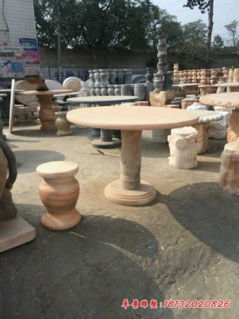 晚霞红圆形石桌凳