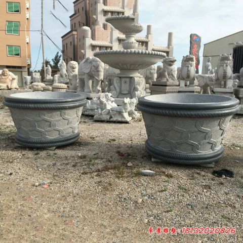 编织花纹浮雕水缸石雕