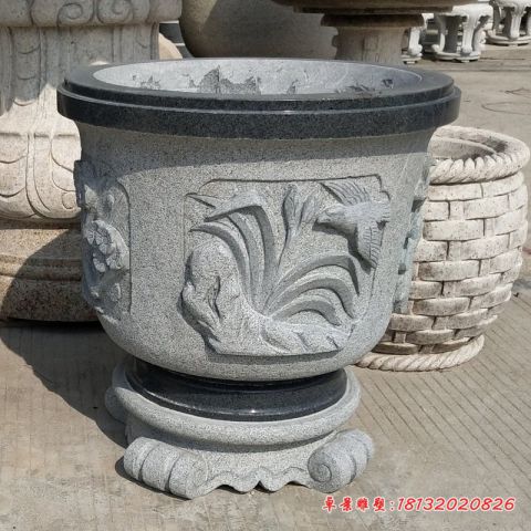 小区梅兰竹菊浮雕花盆石雕