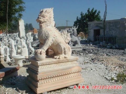 门前晚霞红镇宅踩球石麒麟