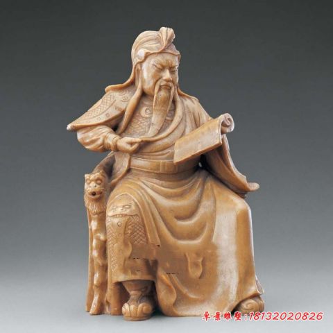 晚霞红关公读春秋石雕