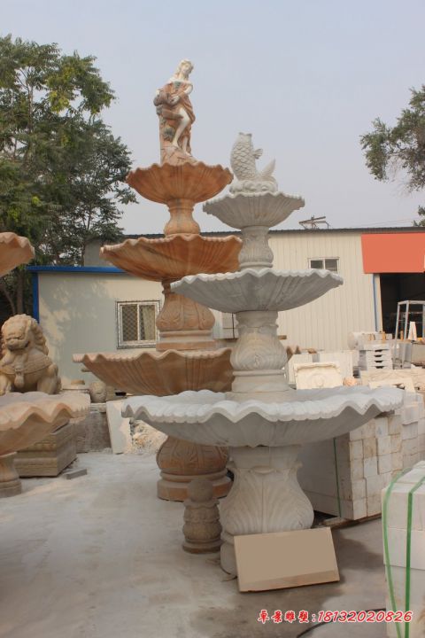 晚霞红三层别墅石雕喷泉