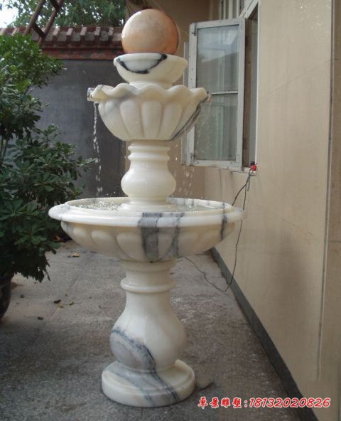 别墅庭院三层风水球石雕