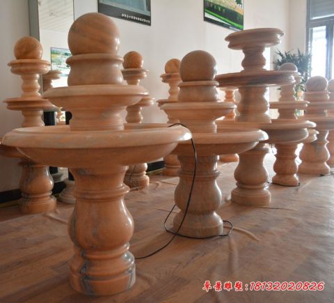 晚霞红室内三层风水球石雕