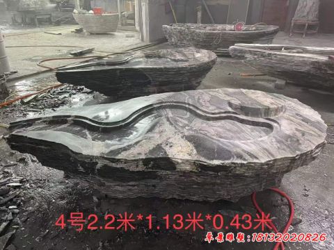 不规则景观石桌雕塑